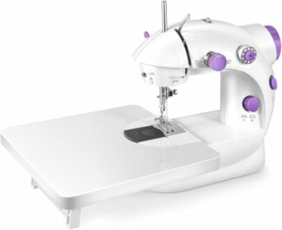 Compact white and purple sewing machine with extension table.