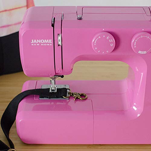 Pink sewing machine on a table